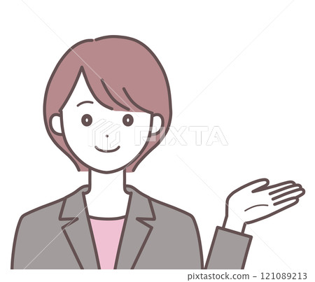 Woman in suit pointing to the side 121089213