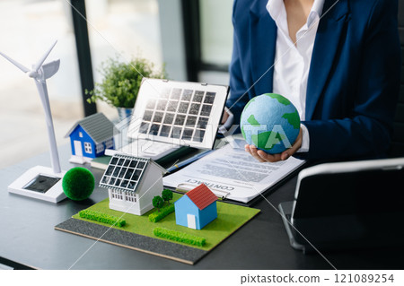 Business planning hand using laptop for working technology and business Net zero and carbon neutral concept.NET ZERO icons and symbols save the eco world 121089254