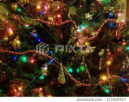 Christmas Tree Decorated with Ornaments and Lights 121089567