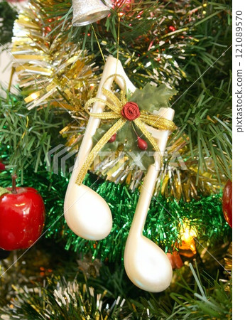 Christmas Tree Decorated with Ornaments and Pine Branches Christmas Tree Decorated with Ornaments and Pine Branches 121089570