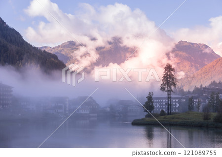 Alleghe, Veneto, Italy houses and lake, fog Alleghe, Veneto, Italy houses and lake, fog 121089755