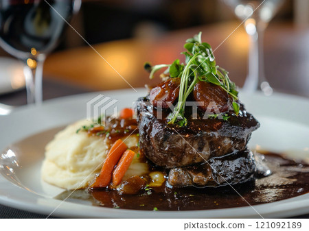Fine restaurant evening dinner gourmet meal with grilled medium beef steak with grilled vegetables on plate.Macro.AI Generative. 121092189