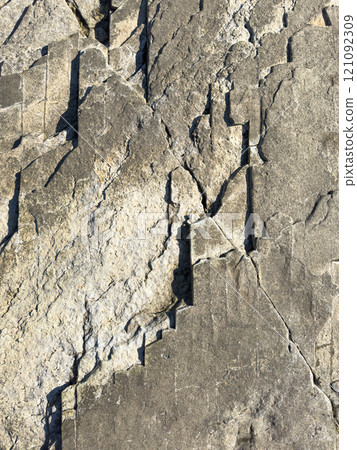 Striking patterns on weathered rock surface in natural setting Striking patterns on weathered rock surface in natural setting 121092309