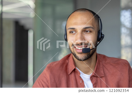 A professional customer service representative wearing a headset provides excellent support with a positive attitude. Capturing the essence of communication and teamwork in office settings. A professional customer service representative wearing a headset provides excellent support with a positive attitude. Capturing the essence of communication and teamwork in office settings. 121092354