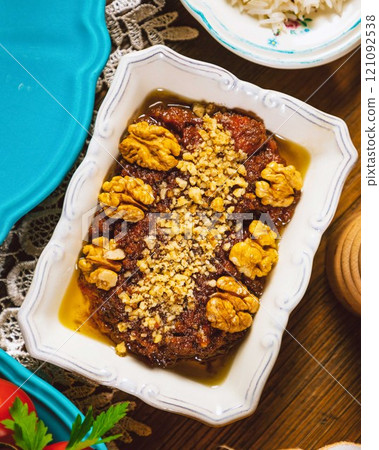 Traditional georgian eggplant dish with walnuts and spices 121092538