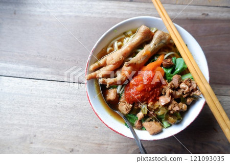 One bowl of traditional Indonesian chicken noodles. One bowl of traditional Indonesian chicken noodles. 121093035