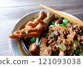 One bowl of traditional Indonesian chicken noodles. This food has a rich, spiced taste. 121093038