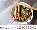 One bowl of traditional Indonesian chicken noodles. This food has a rich, spiced taste. 121093041