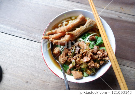 One bowl of traditional Indonesian chicken noodles. This food has a rich, spiced taste. One bowl of traditional Indonesian chicken noodles. This food has a rich, spiced taste. 121093143