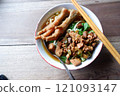 One bowl of traditional Indonesian chicken noodles. This food has a rich, spiced taste. 121093147