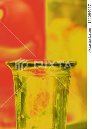 The neck of a vintage glass bottle, modified color scheme, colorful background in pastel colors The neck of a vintage glass bottle, modified color scheme, colorful background in pastel colors 121094057