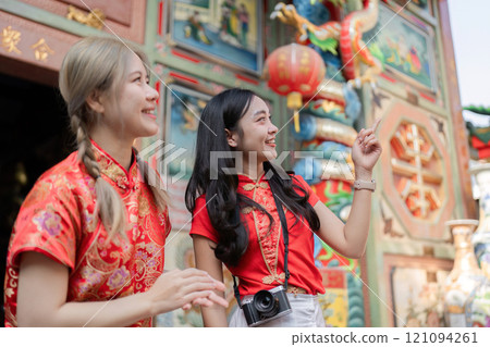 Celebrating chinese new year joyful revelries in a vibrant cultural setting captured moments festive atmosphere optimistic perspectives 121094261