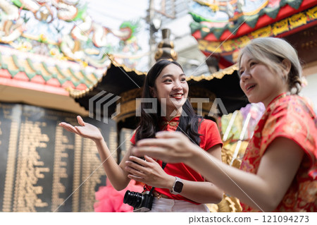 Celebrating chinese new year joyful gatherings in a vibrant cultural setting captured in a lively atmosphere Celebrating chinese new year joyful gatherings in a vibrant cultural setting captured in a lively atmosphere 121094273