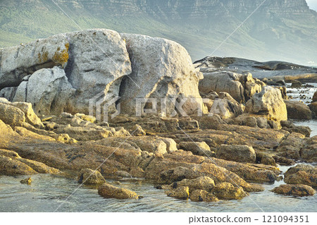 Seascape, landscape, scenic view of boulders and rocks in Hout Bay, Cape Town, South Africa. Ocean, sea washing onto a rocky beach. Travel and tourism abroad, overseas for summer holiday and vacation Seascape, landscape, scenic view of boulders and rocks in Hout Bay, Cape Town, South Africa. Ocean, sea washing onto a rocky beach. Travel and tourism abroad, overseas for summer holiday and vacation 121094351