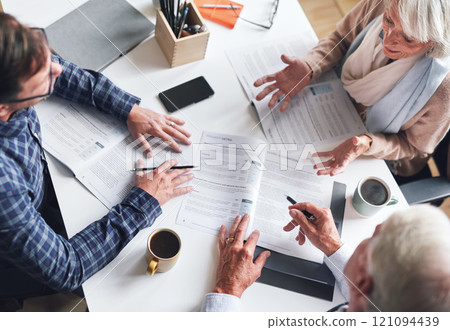 Couple, finance and above with paperwork in meeting for investment, policy and retirement planning. Budgeting, advice and consulting with financial advisor for estate, contract and asset management Couple, finance and above with paperwork in meeting for investment, policy and retirement planning. Budgeting, advice and consulting with financial advisor for estate, contract and asset management 121094439