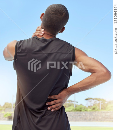 Injured athlete with sore neck and back muscles from behind. Uncomfortable athlete suffering from pain from tight and inflamed joints. Body strain and discomfort caused by overexertion from exercise Injured athlete with sore neck and back muscles from behind. Uncomfortable athlete suffering from pain from tight and inflamed joints. Body strain and discomfort caused by overexertion from exercise 121094564