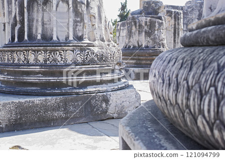 Closeup of architecture pillars in the Temple of Apollo in Didyma, Turkey in the day. Zoomed in and macro detail of design on stone structure in ancient sacred site in Greek history. Famous oracle 121094799