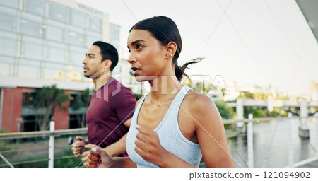 Interracial couple, exercise and running in city for workout, fitness or training together in urban town. Man, woman and athlete with cardio, sports or marathon for endurance and health or wellness Interracial couple, exercise and running in city for workout, fitness or training together in urban town. Man, woman and athlete with cardio, sports or marathon for endurance and health or wellness 121094902