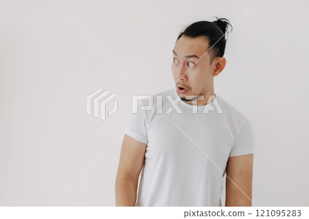 Doubt hesitate funny face man in white t-shirt isolate on white. 121095283
