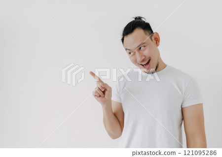 Funny smile of knowing secret tips face man in white t-shirt on white. 121095286