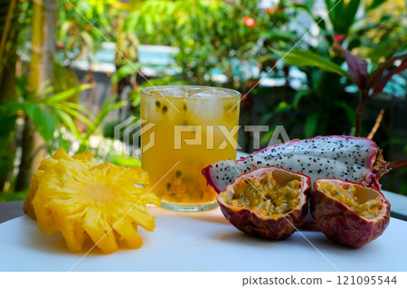 Close up of tropical fruits salad with ingridients on the table. Weight loss concept 121095544
