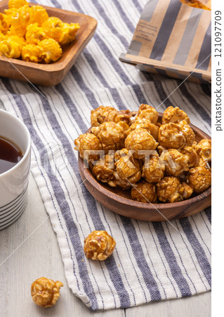 Caramel popcorn on a plate 121097709