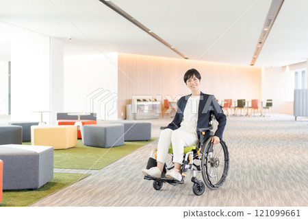 Working woman in a wheelchair 121099661