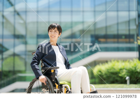 Wheelchair user in a suit 121099978