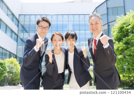 Business person who makes a guts pose Business person who makes a guts pose 121100434
