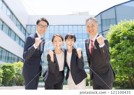 Business person who makes a guts pose 121100435