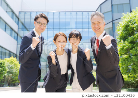 Business person who makes a guts pose 121100436