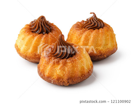 Sweet treats displayed with chocolate frosting on top, perfect for dessert lovers at any celebration 121100902