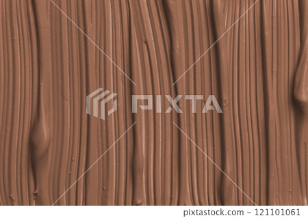 Rich brown paint texture with smooth lines reflecting artistry and creativity in a design studio environment 121101061
