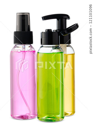 Various bottles with colored liquids and pumps arranged on white background Various bottles with colored liquids and pumps arranged on white background 121101096