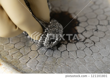 Remove stubborn grease stains from pans 121101801