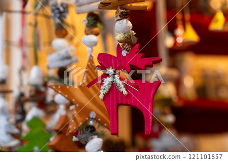 Red Wooden Reindeer Ornament with Festive Accents Red Wooden Reindeer Ornament with Festive Accents 121101857