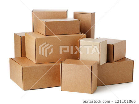 Stacked brown cardboard boxes in various sizes arranged on a white background Stacked brown cardboard boxes in various sizes arranged on a white background 121101866