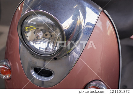 Pink scooter moped 121101872