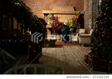girl celebration new christmas cozy home young holiday alone tree woman year fireplace 121102182