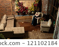 girl woman fireplace tree alone cozy year holiday young celebration christmas home new 121102184