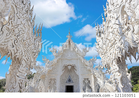 Wat Rong Khun (White Temple) main entrance in a sunny day in Chiang Rai, Thailand 121103051