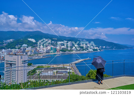 Tourists and the view to the north (Atami city, Mt. Iwato, etc.) from the summit station of the Atami Ropeway in Atami City, Shizuoka Prefecture 121103819