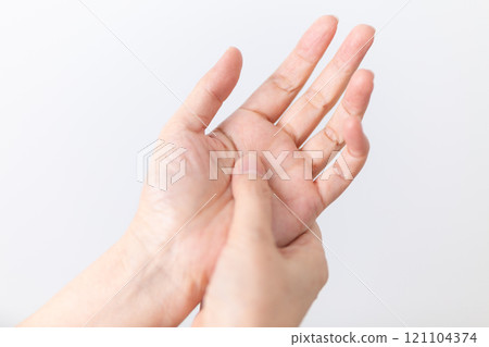 Middle-aged to senior women's hands 121104374