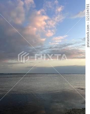 Beautiful sunset on ocean beach. Sky is reflecting at water. Philippines, Bohol Beautiful sunset on ocean beach. Sky is reflecting at water. Philippines, Bohol 121104781