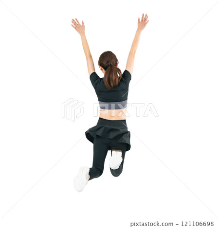 The back view of a woman jumping in sportswear. A transparent full-body photo PNG precisely cut by hand The back view of a woman jumping in sportswear. A transparent full-body photo PNG precisely cut by hand 121106698