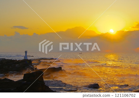 Scenery of a small lighthouse and sunrise on the rough coast of Chikura Town, Minamiboso, Ver5 121106702