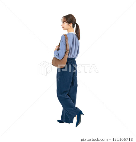 The back view of a woman walking in casual wear. A transparent full-body photo PNG precisely cut by hand The back view of a woman walking in casual wear. A transparent full-body photo PNG precisely cut by hand 121106718