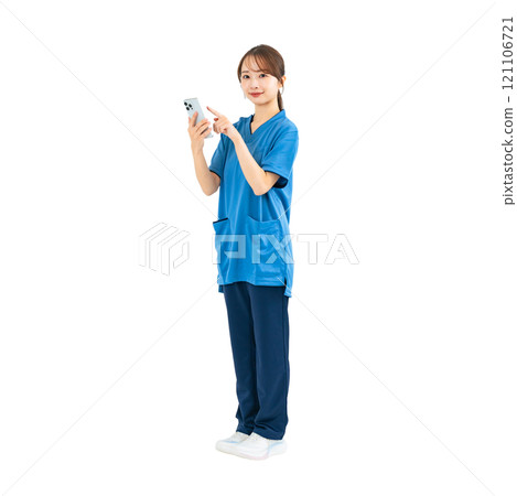 A woman wearing a scrub and using a smartphone - A transparent full-body photo PNG precisely cut by hand 121106721