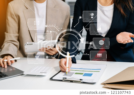 Business team partnership meeting concept. Business hand using laptop, tablet and smartphone Digital marketing media mobile app in virtual icon Business team partnership meeting concept. Business hand using laptop, tablet and smartphone Digital marketing media mobile app in virtual icon 121107743