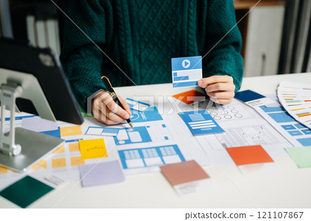 UX graphic designer planning application process development prototype wireframe for web smart phone. Creative digital development 121107867